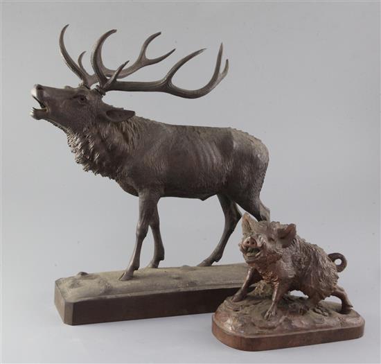 A Black Forest carved wood model of a ten point stag, height 6in.
